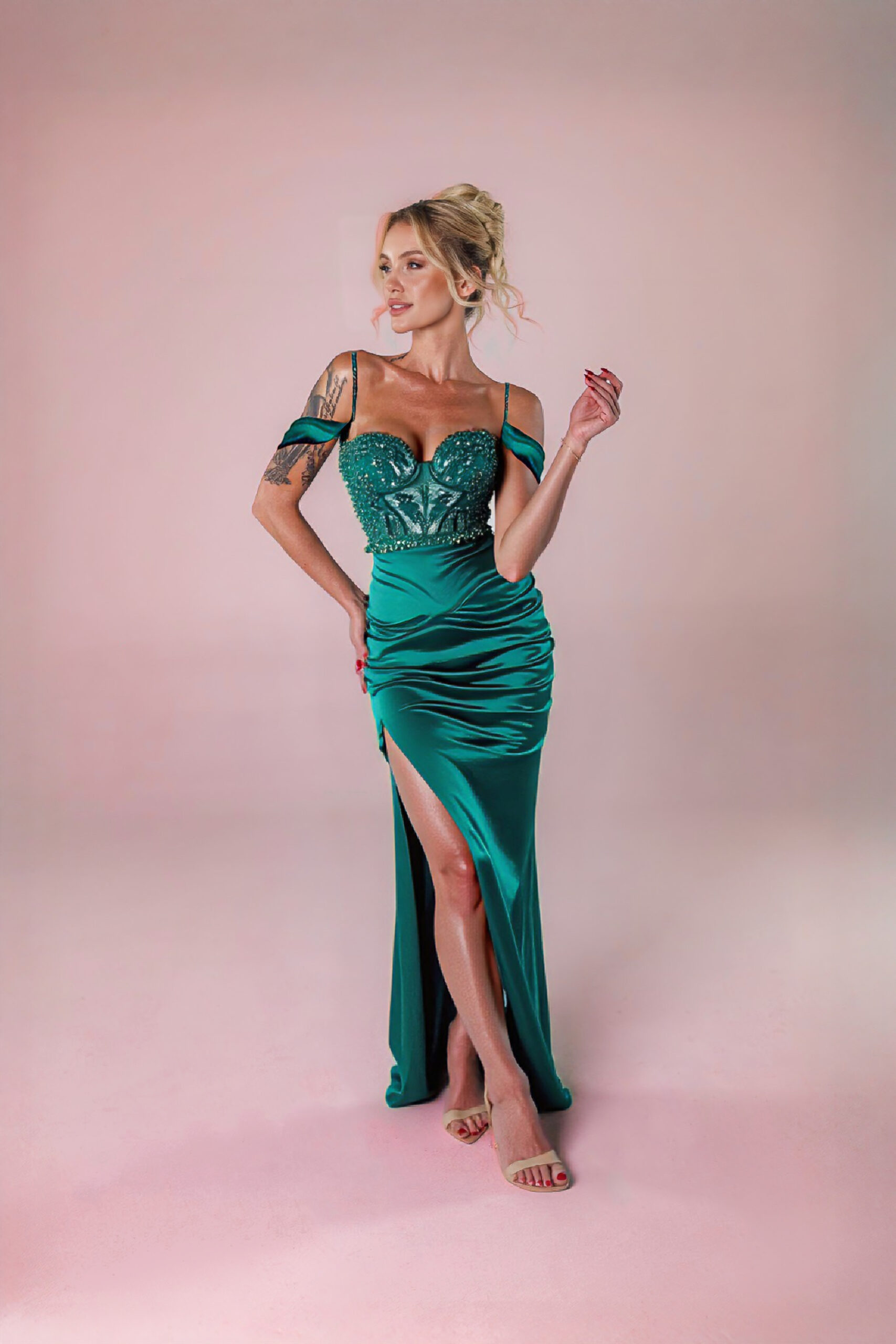 A stylish green dress from Andrea Stanic's, perfect for Cocktail Dress
