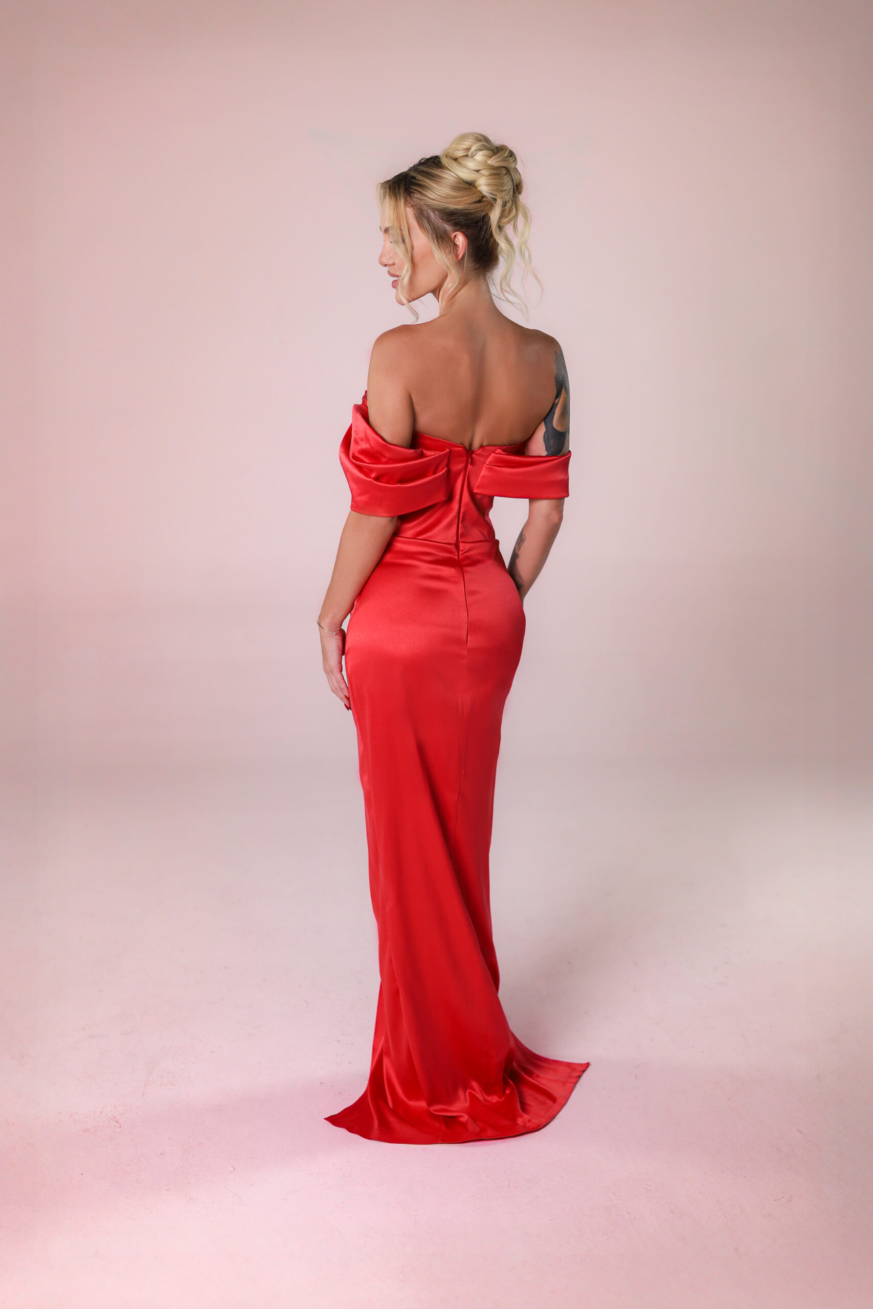 Back view showcasing the dress design by Andrea Stanic.